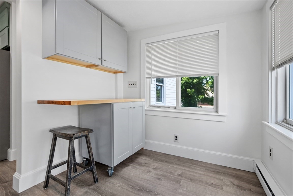 129 Virginia Road Waltham, MA 02453 - Photo 6 of 27 a view of an empty room with a window