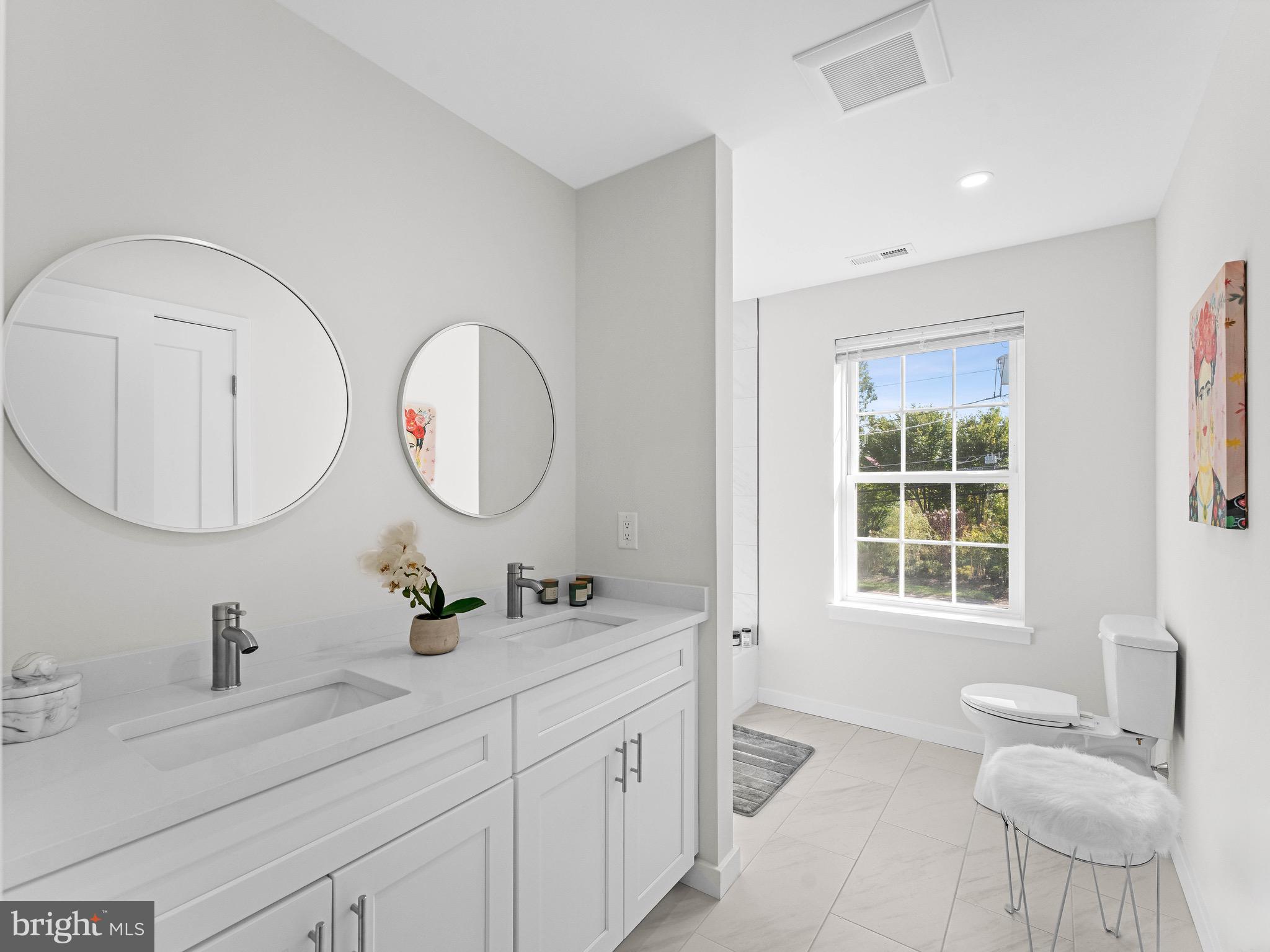 550 Jackson Road Atco, NJ 08004 - Photo 31 of 41 a bathroom with a double vanity sink and a mirror