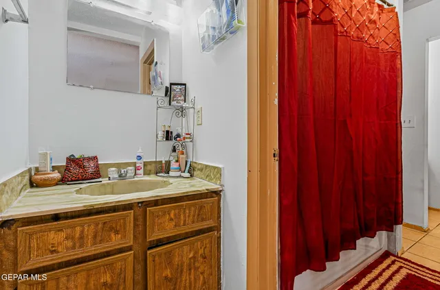 a bathroom with a tub and a shower