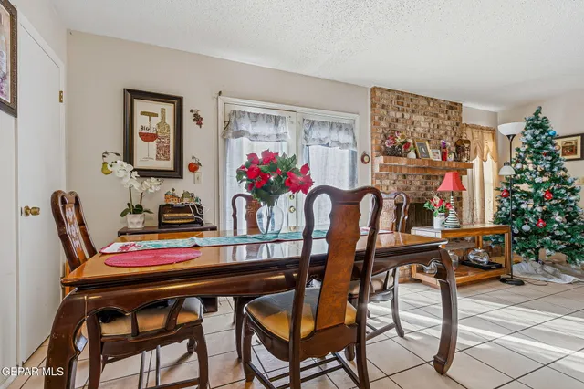 a kitchen with stainless steel appliances granite countertop wooden cabinets a stove top oven a sink and dishwasher