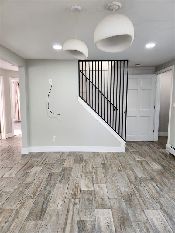 42 Ancona Road Worcester, MA 01604 - Photo 11 of 42 a view of a room with wooden floor and windows