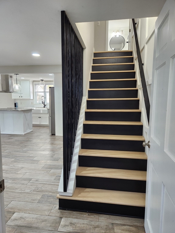 42 Ancona Road Worcester, MA 01604 - Photo 26 of 42 a view of entryway and hall with wooden floor
