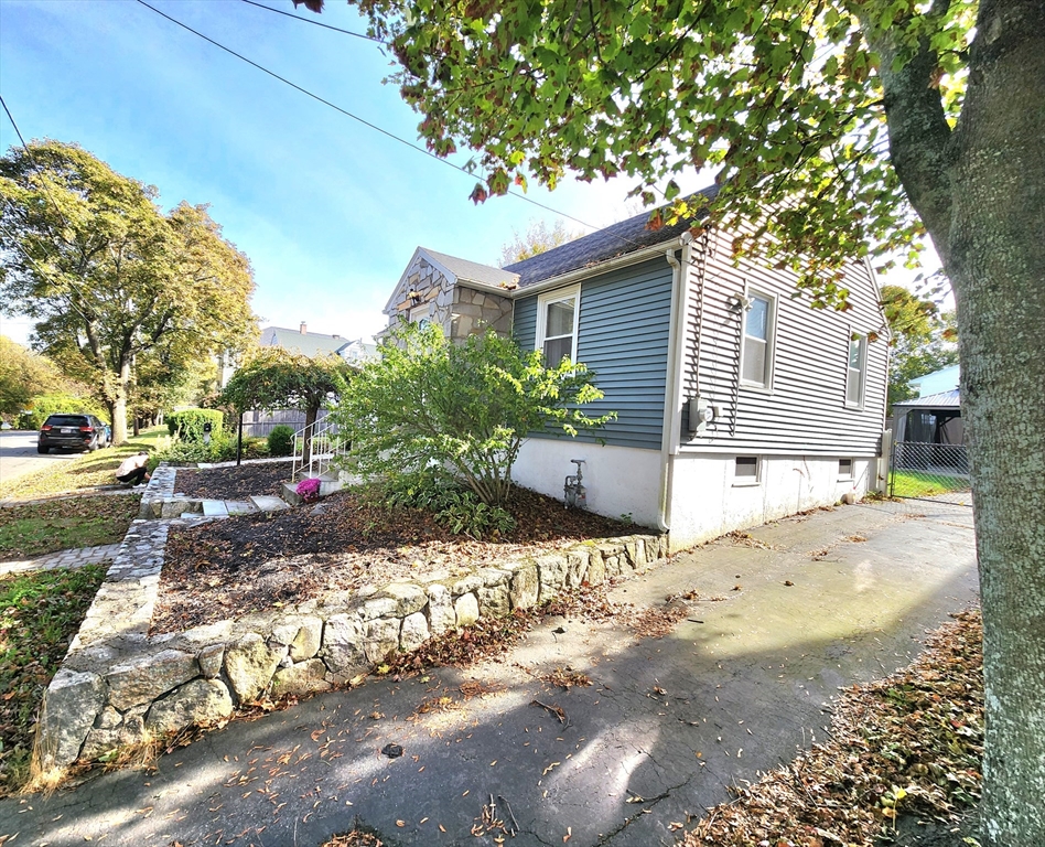 42 Ancona Road Worcester, MA 01604 - Photo 4 of 42 a front view of a house with a yard