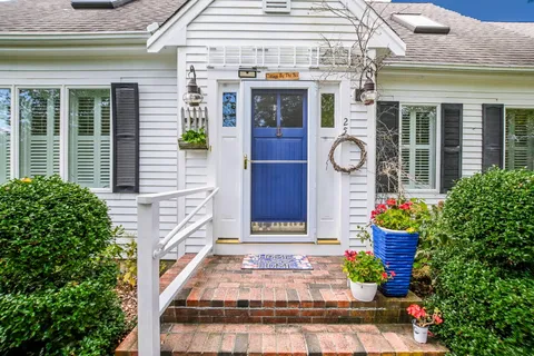 a front view of a house with an outdoor space