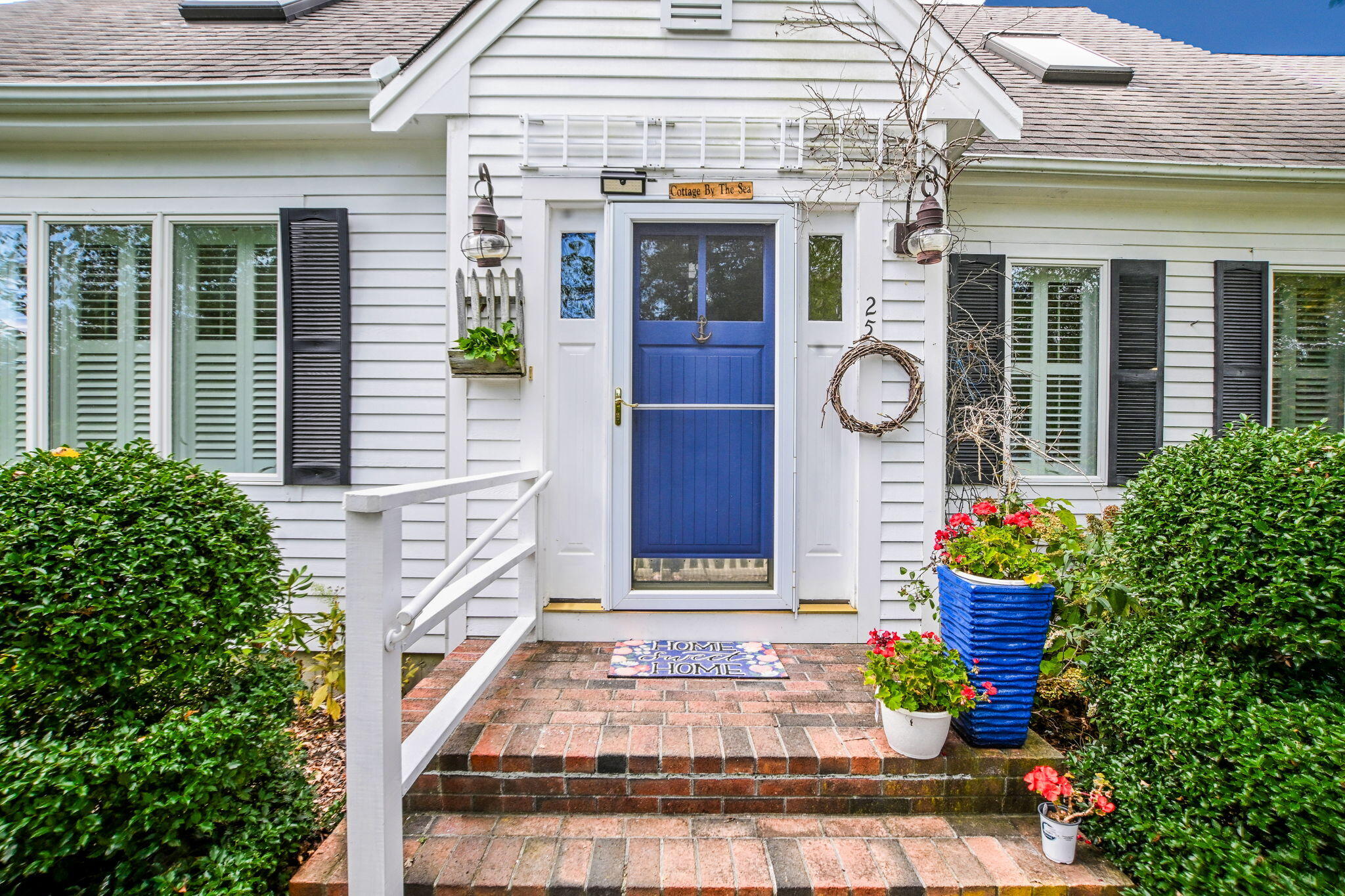 25 Harris Hill Road East Falmouth, MA 02536 - Photo 1 of 37 a front view of a house with an outdoor space
