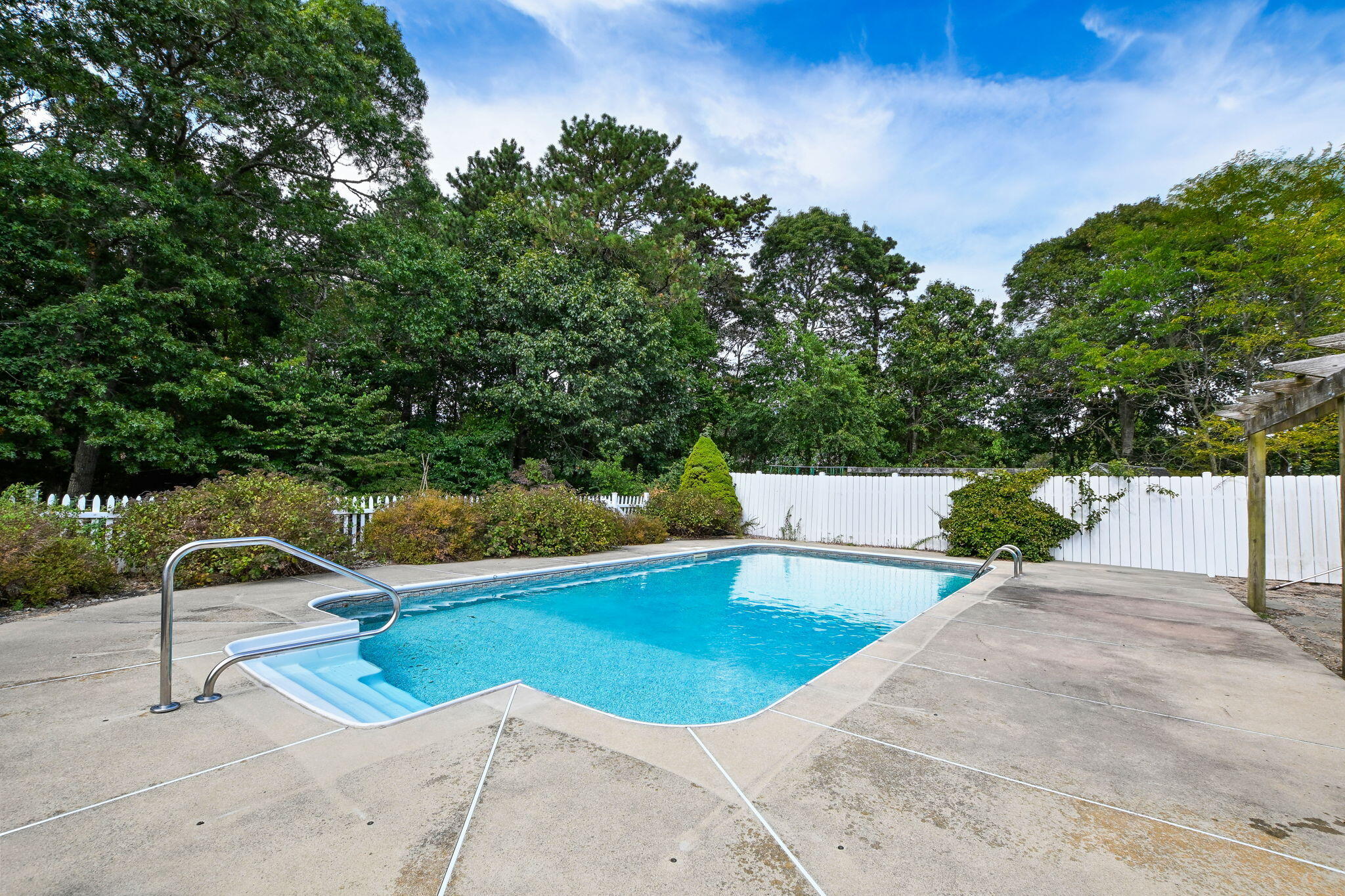 25 Harris Hill Road East Falmouth, MA 02536 - Photo 24 of 37 a view of a swimming pool with a patio and a yard