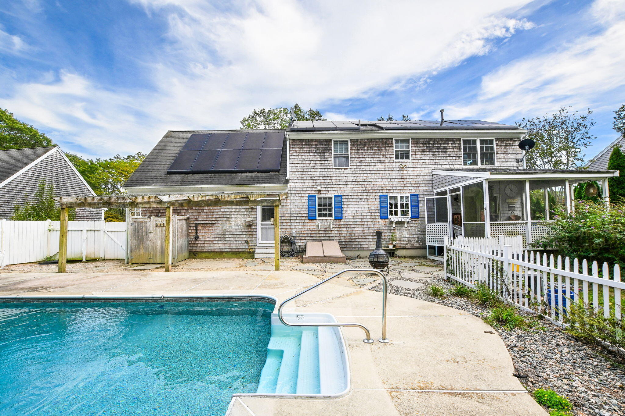 25 Harris Hill Road East Falmouth, MA 02536 - Photo 26 of 37 a view of a house with backyard sitting area and garden