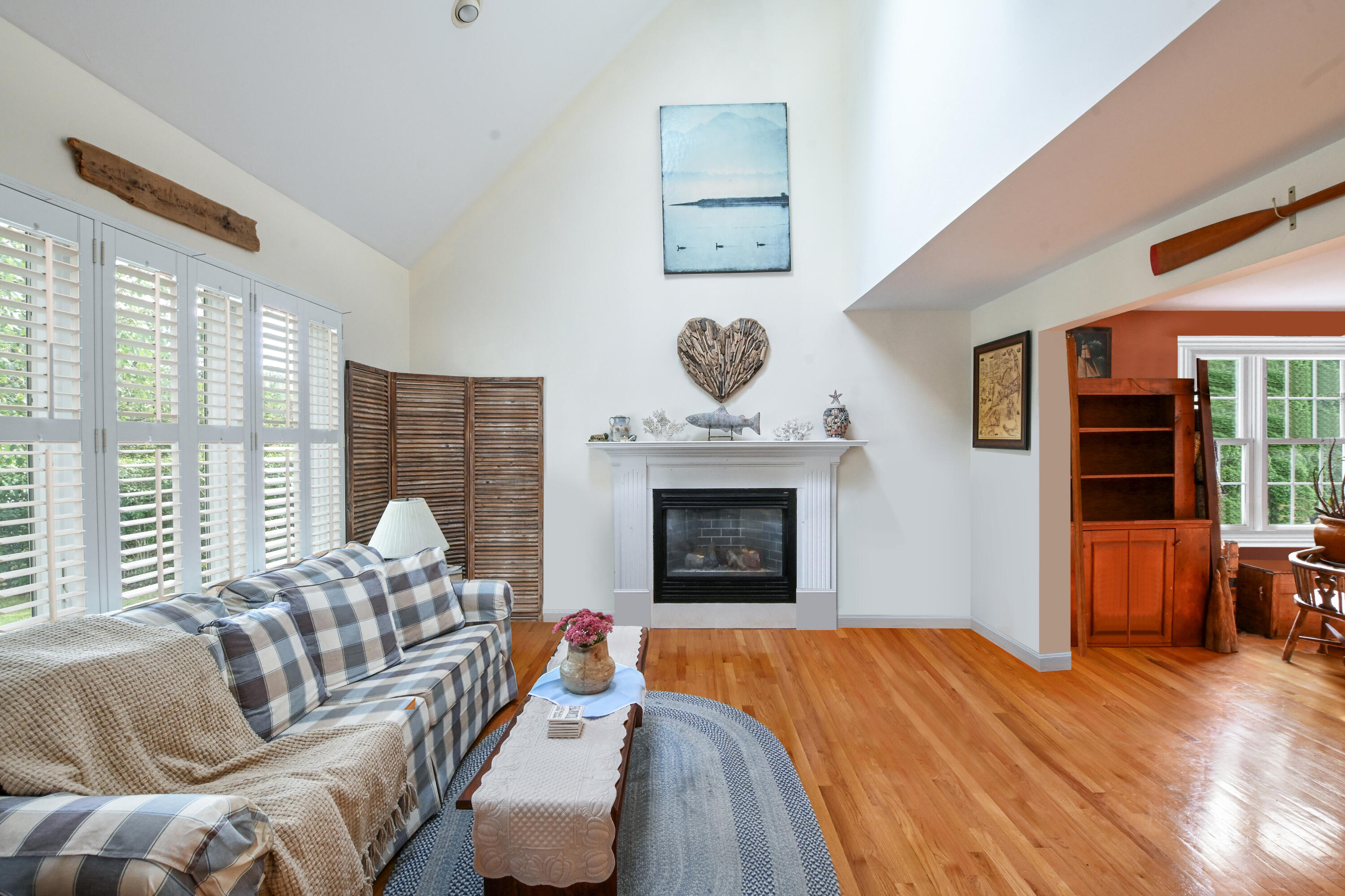 25 Harris Hill Road East Falmouth, MA 02536 - Photo 5 of 37 a living room with furniture and a fireplace