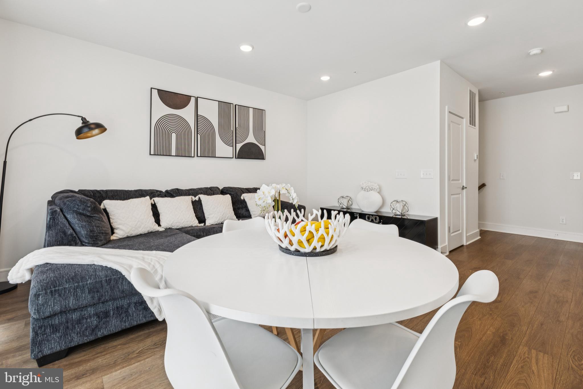 42597 Nubbins Terrace Ashburn, VA 20147 - Photo 13 of 40 a view of a dining room with furniture