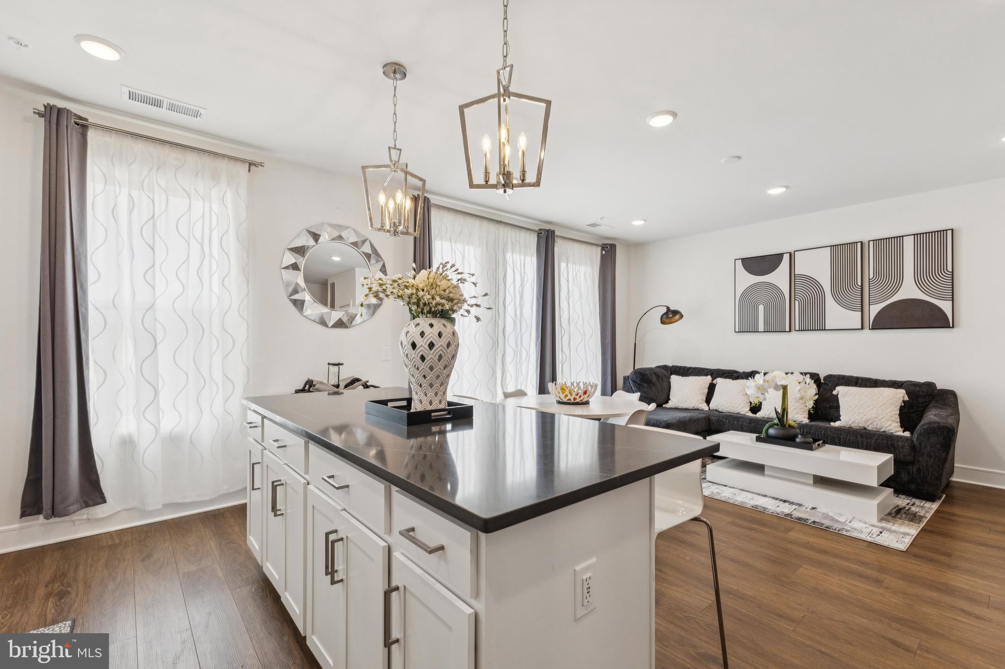 42597 Nubbins Terrace Ashburn, VA 20147 - Photo 18 of 40 a kitchen with counter top space and stainless steel appliances