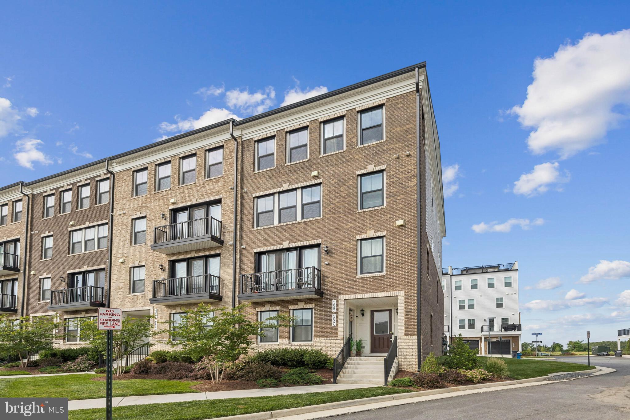 42597 Nubbins Terrace Ashburn, VA 20147 - Photo 2 of 40 a front view of a building