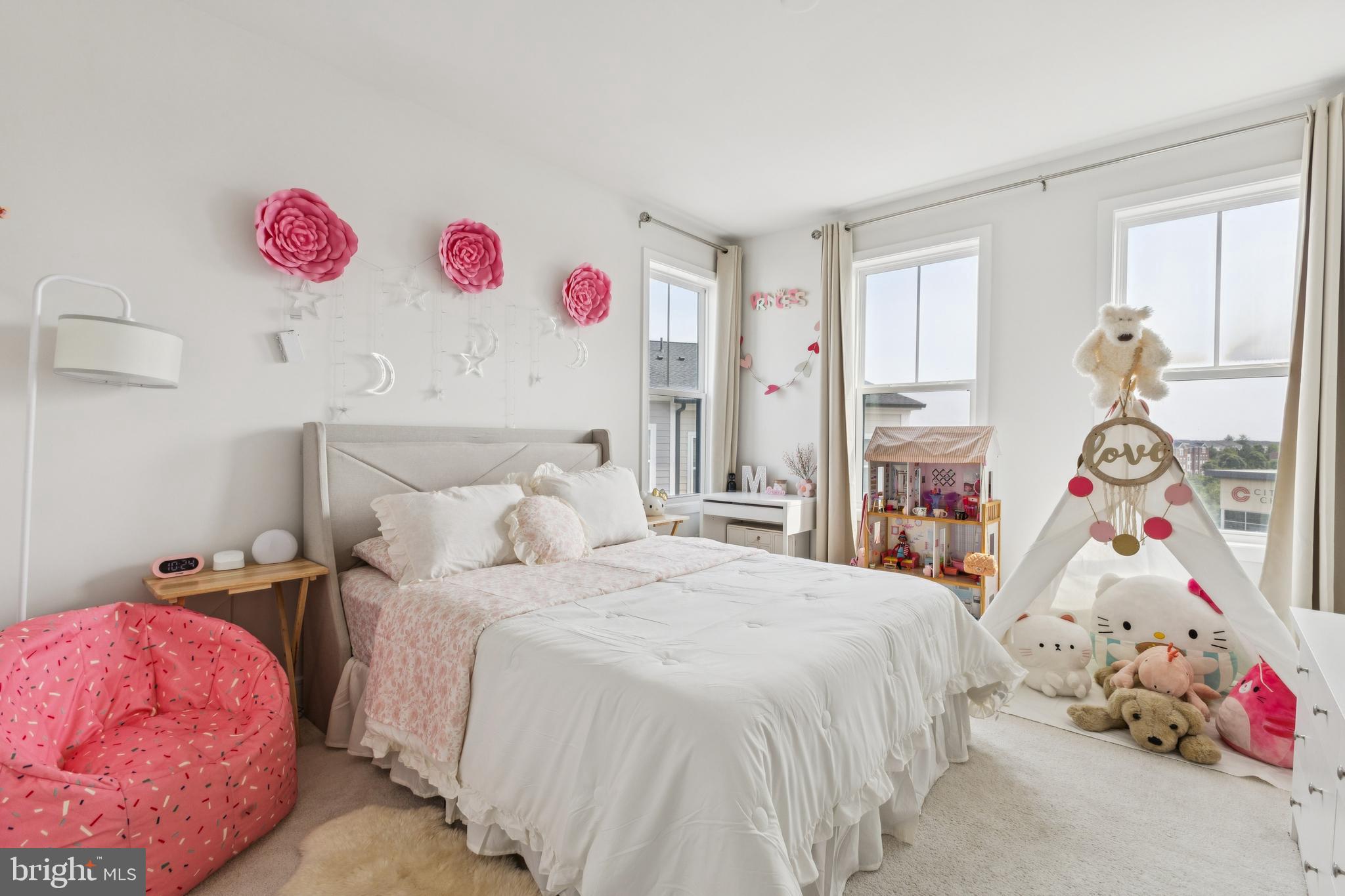 42597 Nubbins Terrace Ashburn, VA 20147 - Photo 34 of 40 a bedroom with a bed and a window