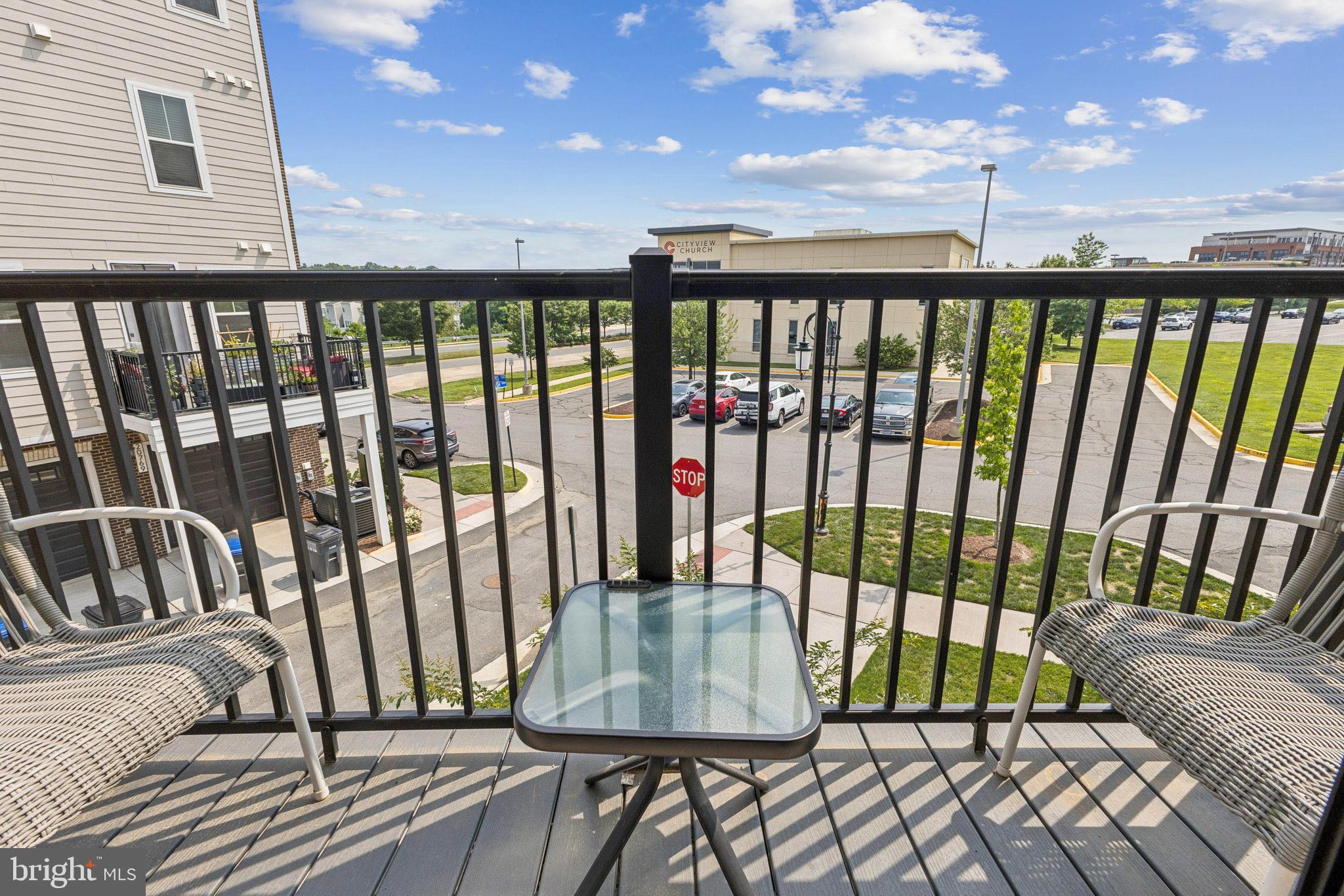 42597 Nubbins Terrace Ashburn, VA 20147 - Photo 38 of 40 a view of a balcony with furniture