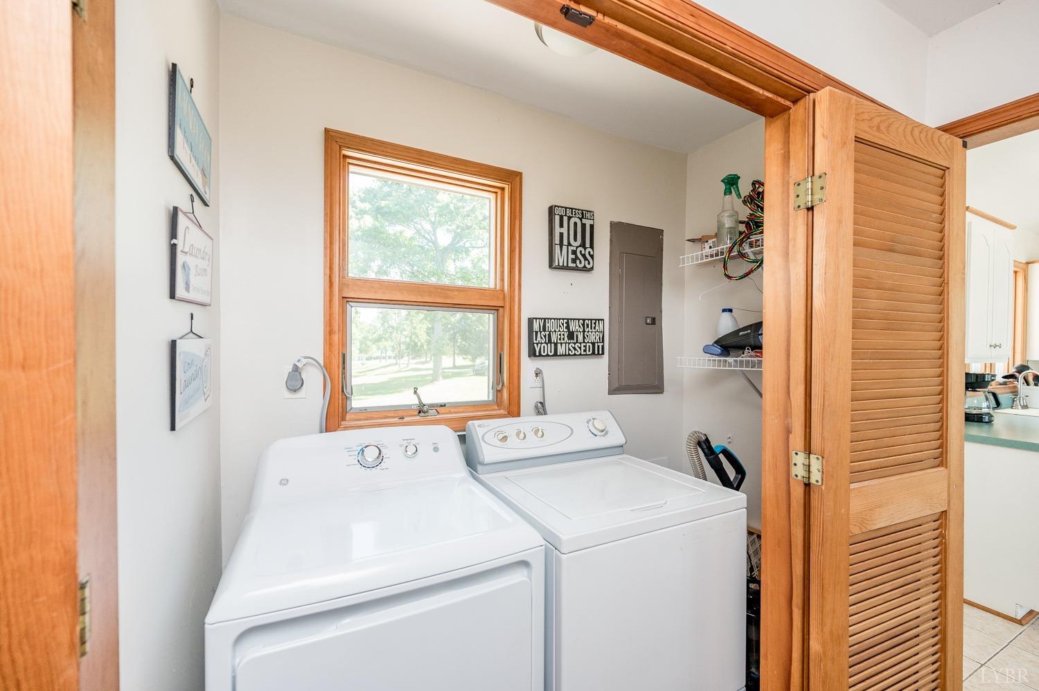 311 Anthony Home Road Huddleston, VA 24104 - Photo 11 of 70 a view of washer and dryer with bathroom in the background