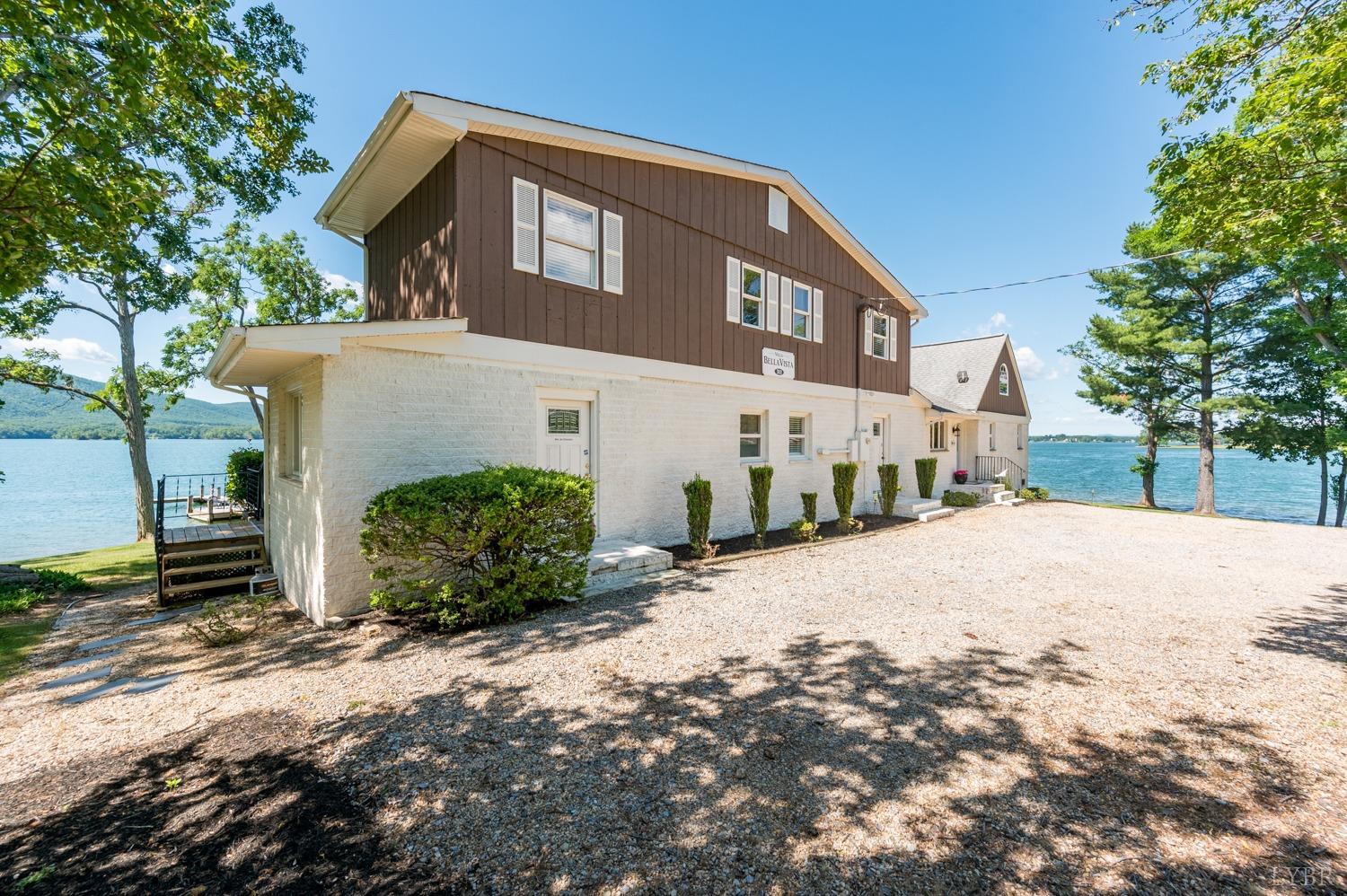 311 Anthony Home Road Huddleston, VA 24104 - Photo 50 of 70 a front view of a house with a yard