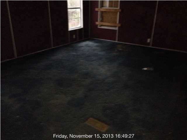 261 Don Graff Road Freeport, FL 32439 - Photo 2 of 20 a view of an empty room with a kitchen