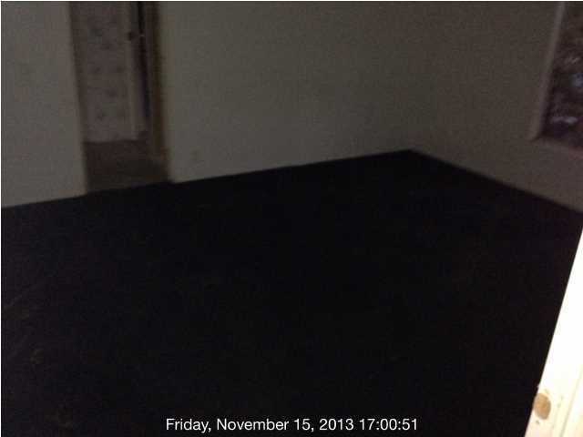 261 Don Graff Road Freeport, FL 32439 - Photo 18 of 20 a view of an empty room with wooden floor