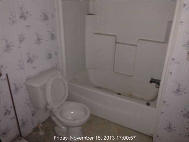 261 Don Graff Road Freeport, FL 32439 - Photo 19 of 20 a bathroom with a toilet and a shower