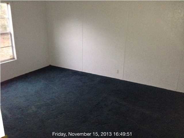 261 Don Graff Road Freeport, FL 32439 - Photo 6 of 20 an empty room with a window
