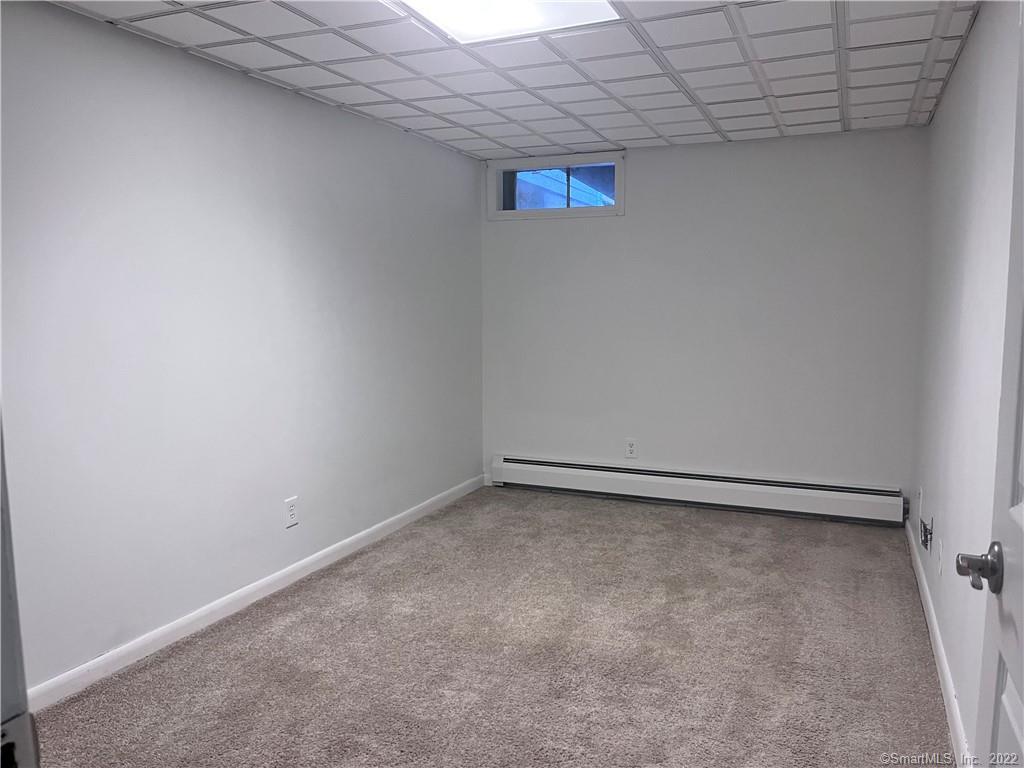 745 Greens Loop, Unit 745 Cheshire, CT 06410 - Photo 21 of 22 a view of an empty room