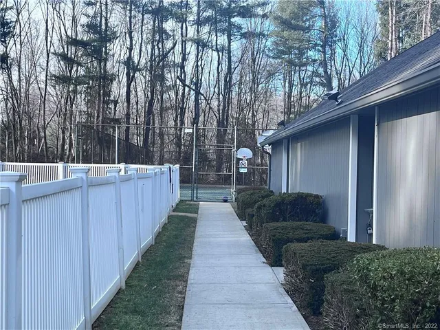a house view with a backyard space