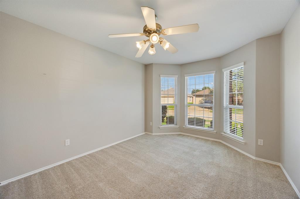 2271 Fieldcrest Drive Rockwall, TX 75032 - Photo 13 of 24 a view of an empty room with a window