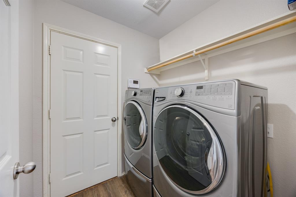 2271 Fieldcrest Drive Rockwall, TX 75032 - Photo 15 of 24 a utility room with dryer and washer