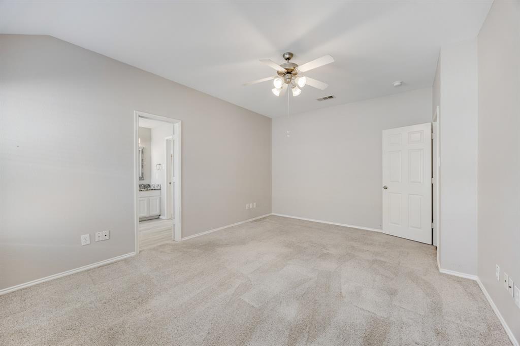 2271 Fieldcrest Drive Rockwall, TX 75032 - Photo 18 of 24 a view of an empty room with a fan