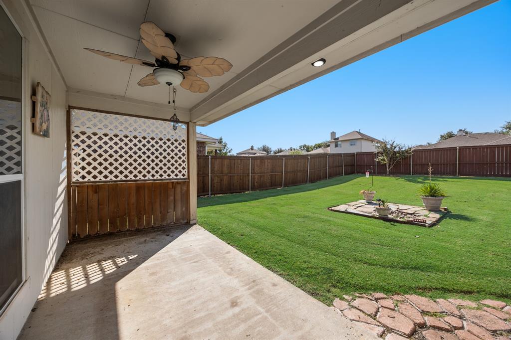 2271 Fieldcrest Drive Rockwall, TX 75032 - Photo 21 of 24 a view of a backyard with a garden
