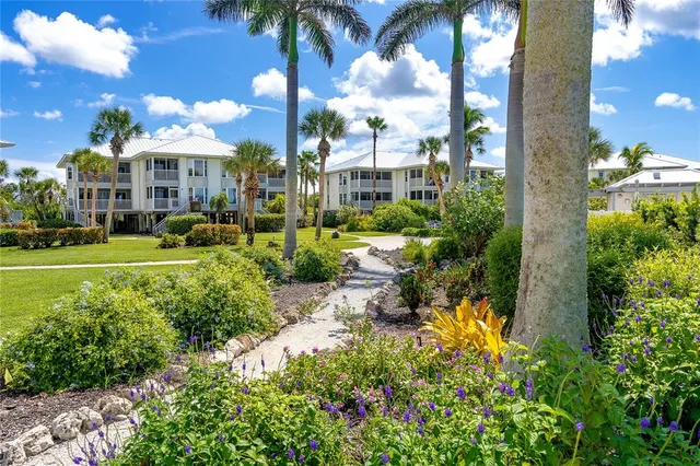 a view of a building with a garden
