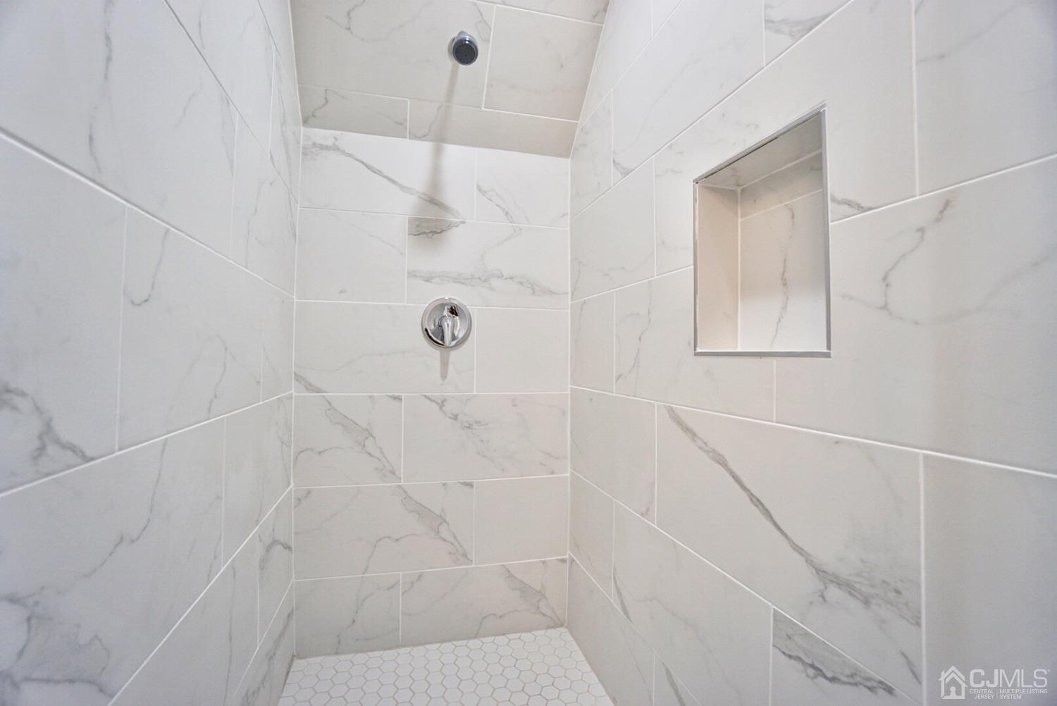 106 Ridge Road Colonia, NJ 07067 - Photo 34 of 44 a bathroom with a shower
