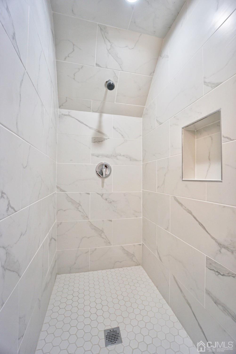 106 Ridge Road Colonia, NJ 07067 - Photo 35 of 44 a bathroom with a shower