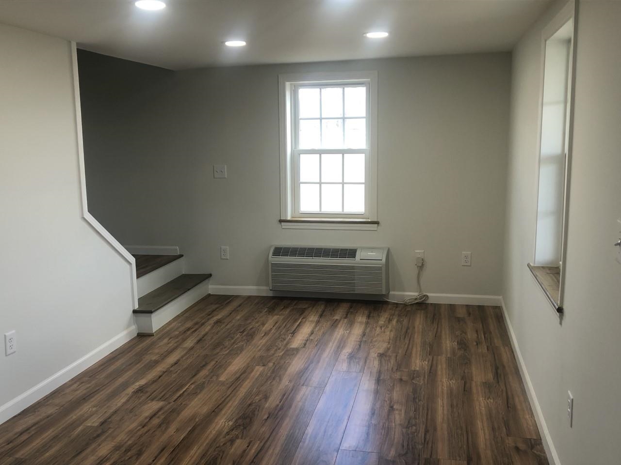 7057 Briery Branch Road Dayton, VA 22821 - Photo 12 of 29 wooden floor in an empty room with a window