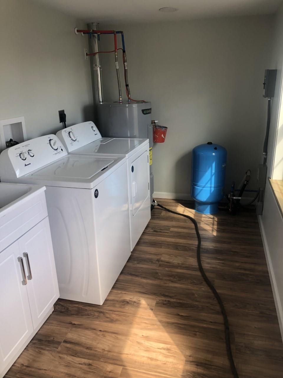 7057 Briery Branch Road Dayton, VA 22821 - Photo 18 of 29 a bathroom with a sink and a mirror