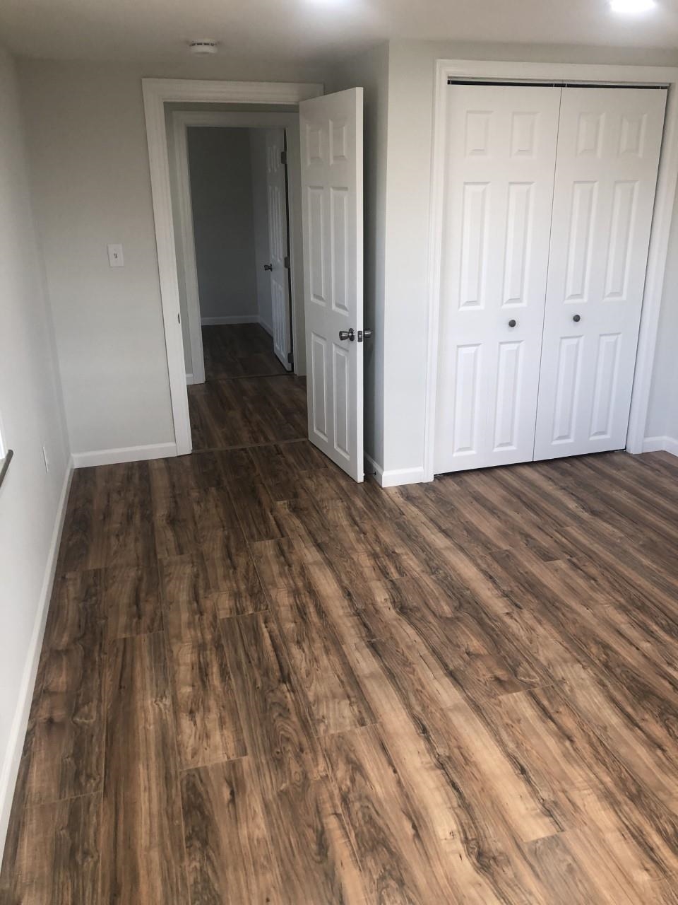 7057 Briery Branch Road Dayton, VA 22821 - Photo 26 of 29 a view of an empty room with wooden floor