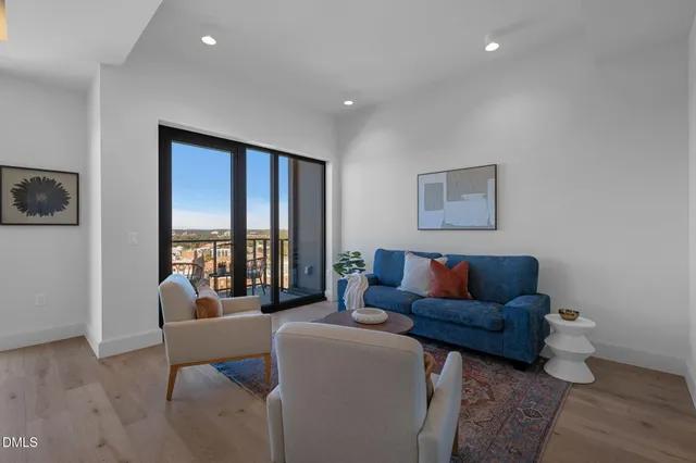 a bathroom with a double vanity sink mirror and shower