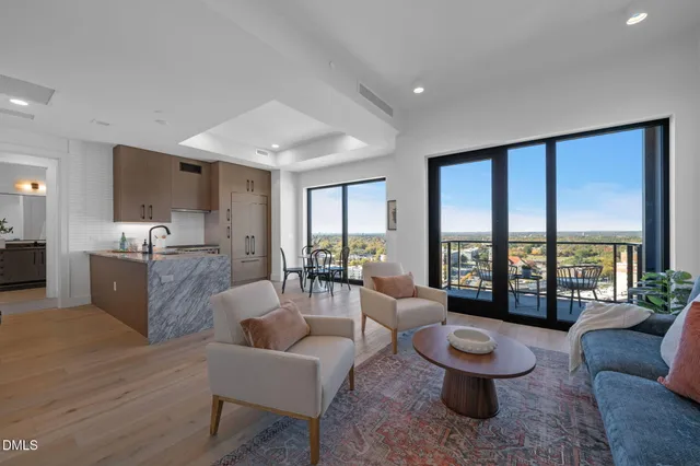 a view of a hallway with washer and dryer