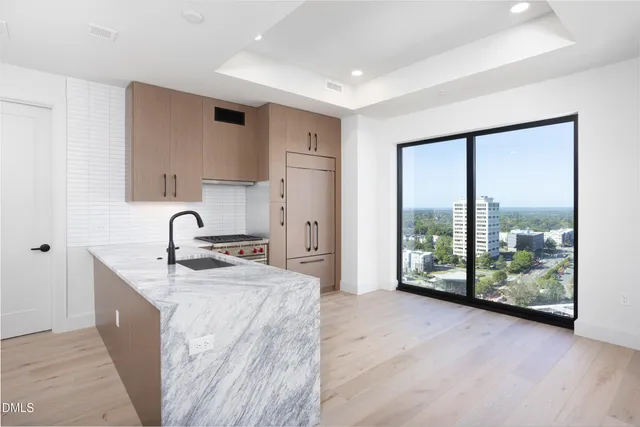 a view of a workspace with furniture