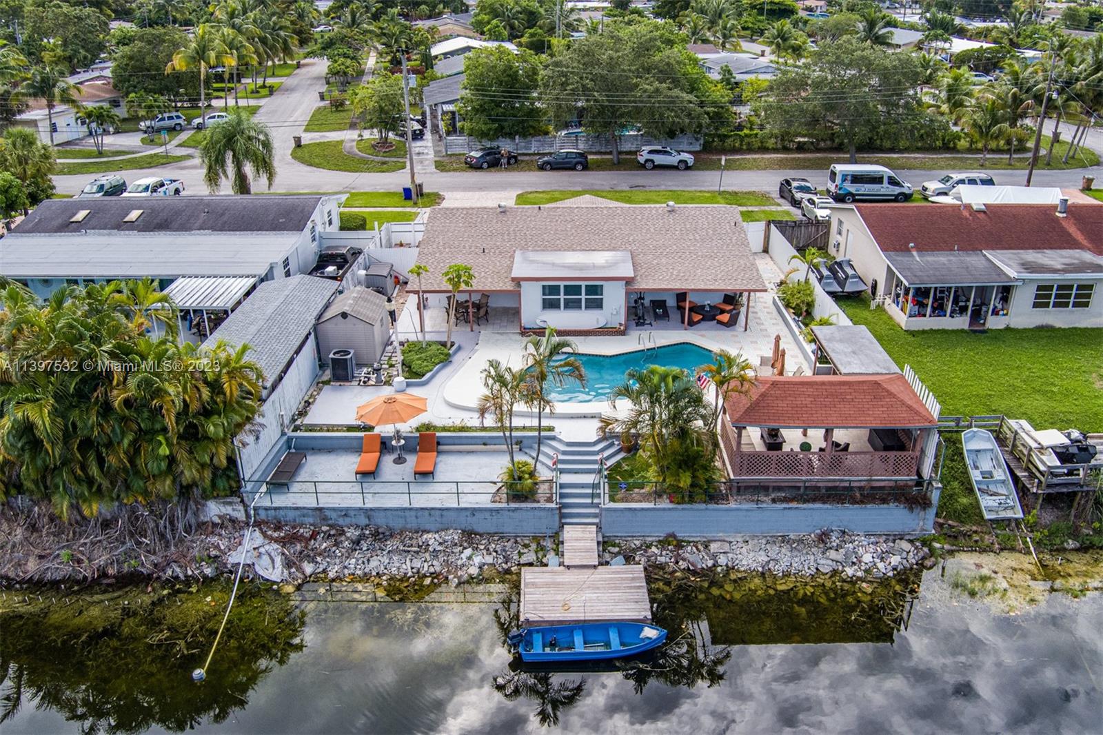 3820 Northwest 7th Avenue Deerfield Beach, FL 33064 - Photo 13 of 37 an aerial view of houses with yard