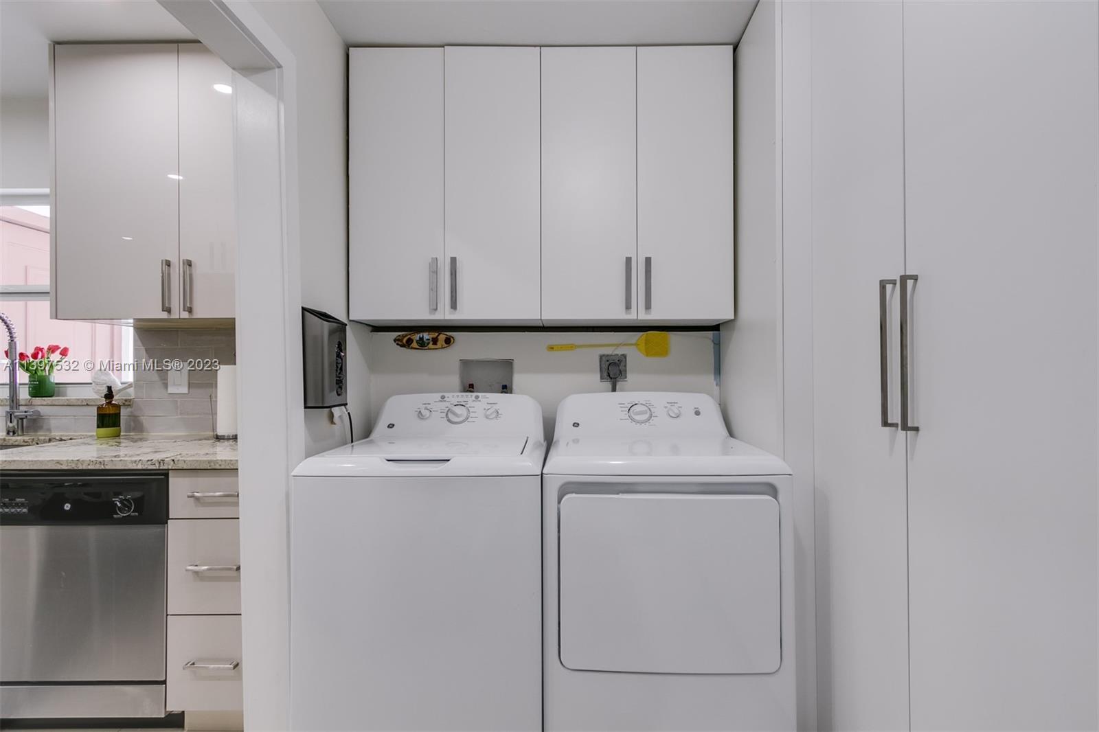 3820 Northwest 7th Avenue Deerfield Beach, FL 33064 - Photo 21 of 37 a utility room with dryer and washer