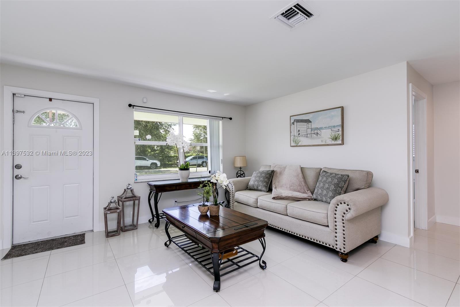 3820 Northwest 7th Avenue Deerfield Beach, FL 33064 - Photo 25 of 37 a living room with furniture