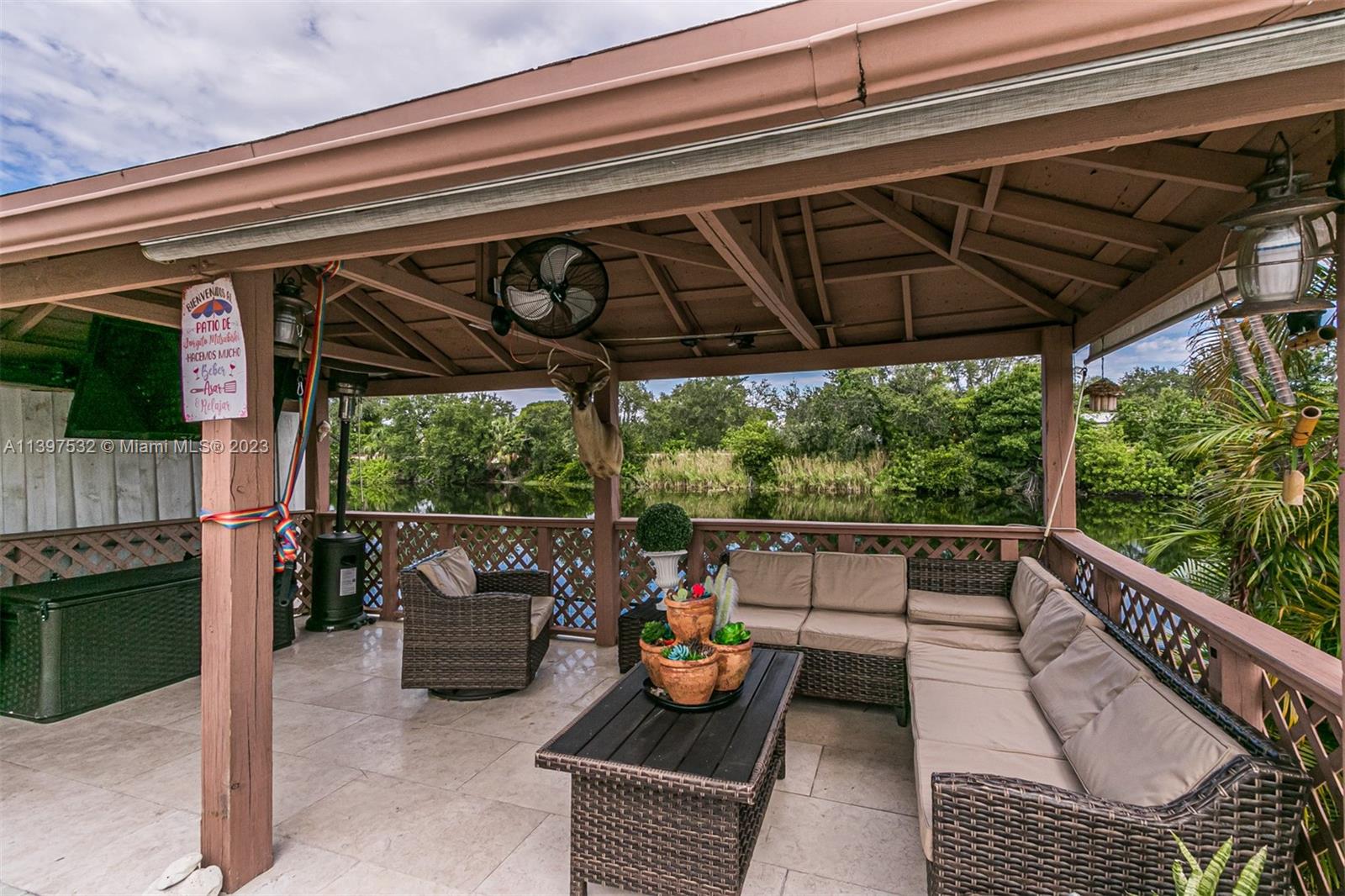 3820 Northwest 7th Avenue Deerfield Beach, FL 33064 - Photo 3 of 37 a view of porch with a patio
