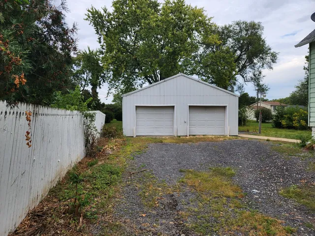 a house with trees in front of it
