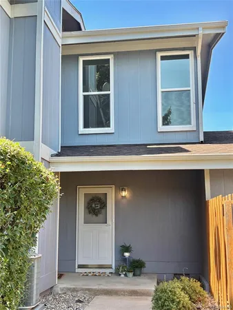 a view of a park with plants and trees