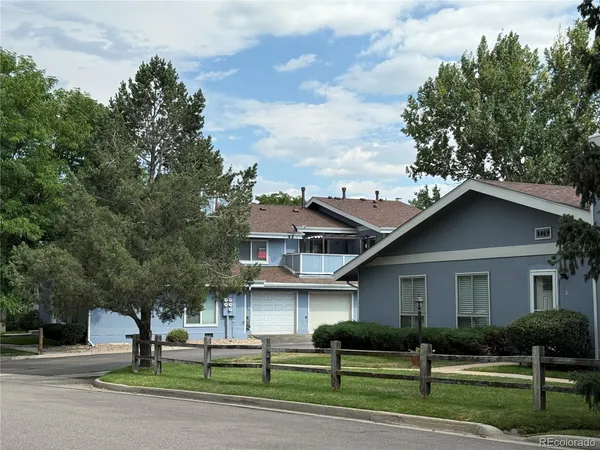 a view of a house with a garage