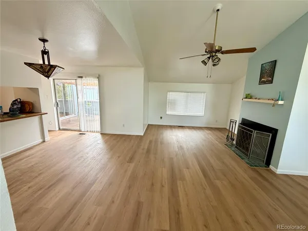 a view of a livingroom with a dishwasher and cabinets