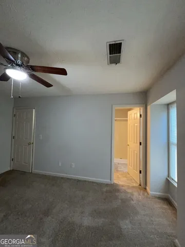 an empty room with a window