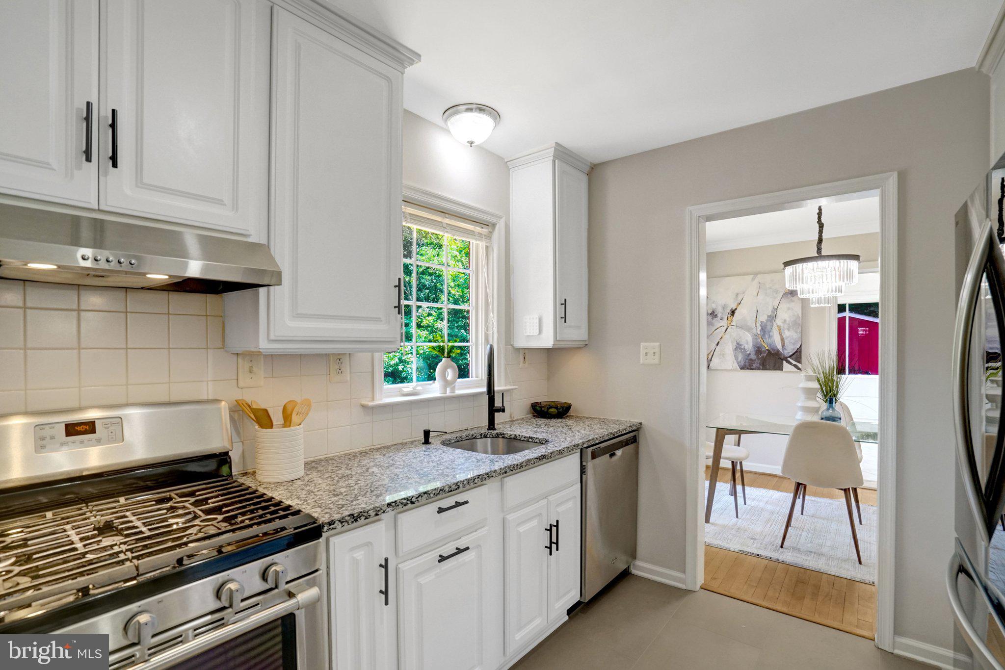 7107 Coventry Road Alexandria, VA 22306 - Photo 14 of 64 Kitchen opening to dining area