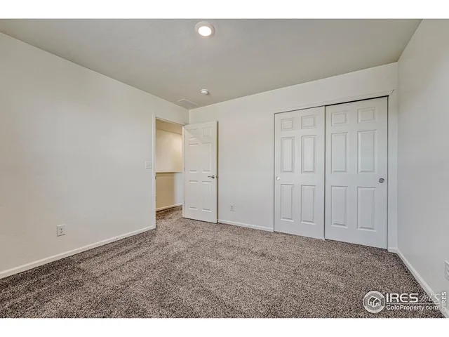a view of a room with furniture and a yard