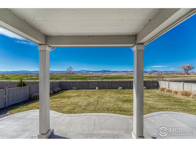 a swimming pool with wooden fence